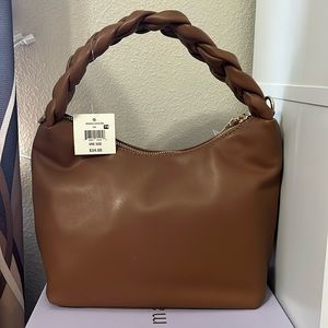 Cognac colored faux leather braided strap purse with crossbody strap